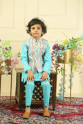 Child wearing a traditional outfit with a floral background