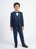 Young boy wearing a blue suit with a bow tie on a white background